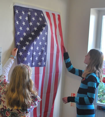 Tilley abd Imogen carefully removing the flag that covered the flag-box